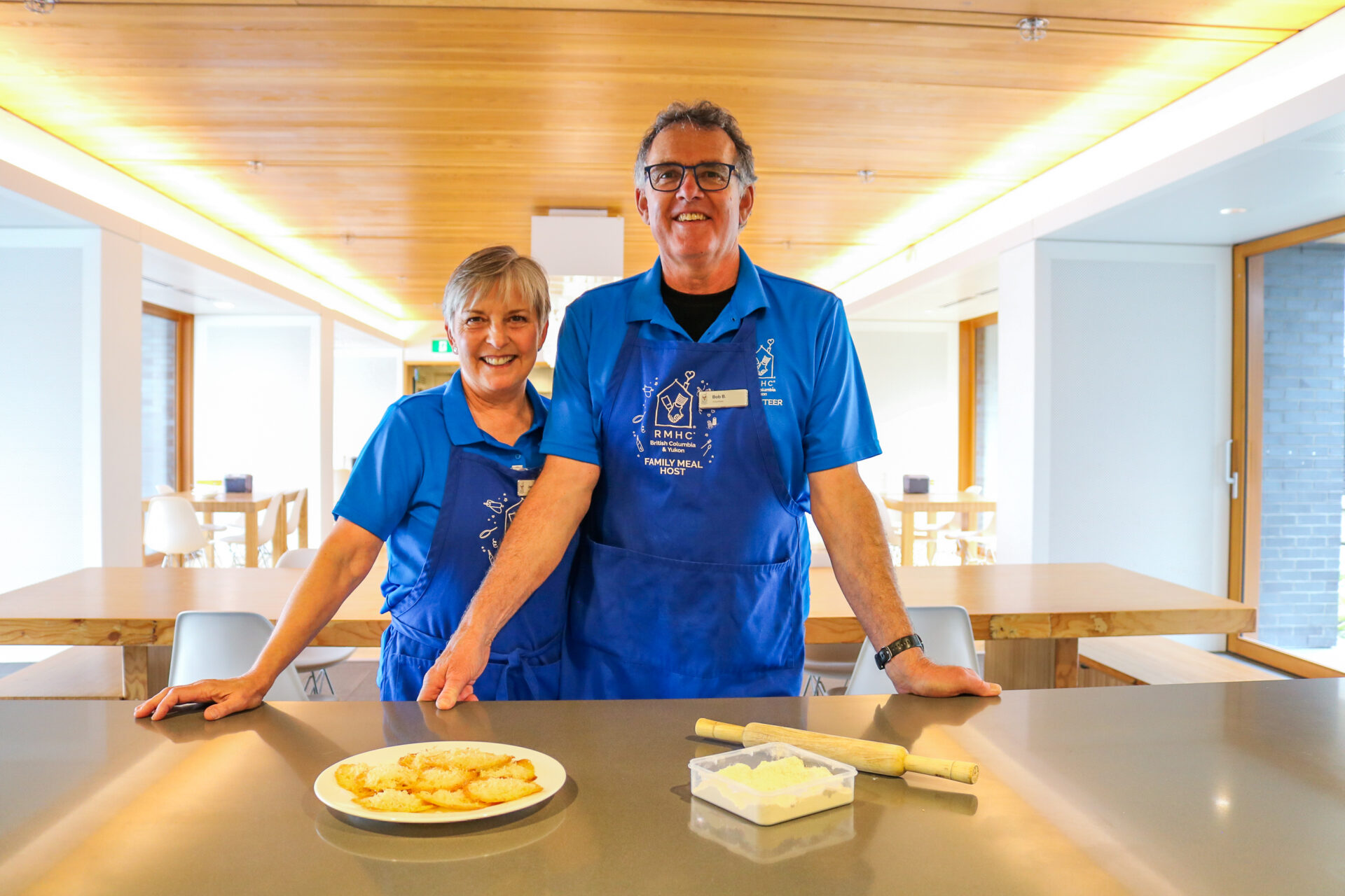 Bob and Jennifer, RMH BC Monthly Donors and Volunteers making cookies for our families.