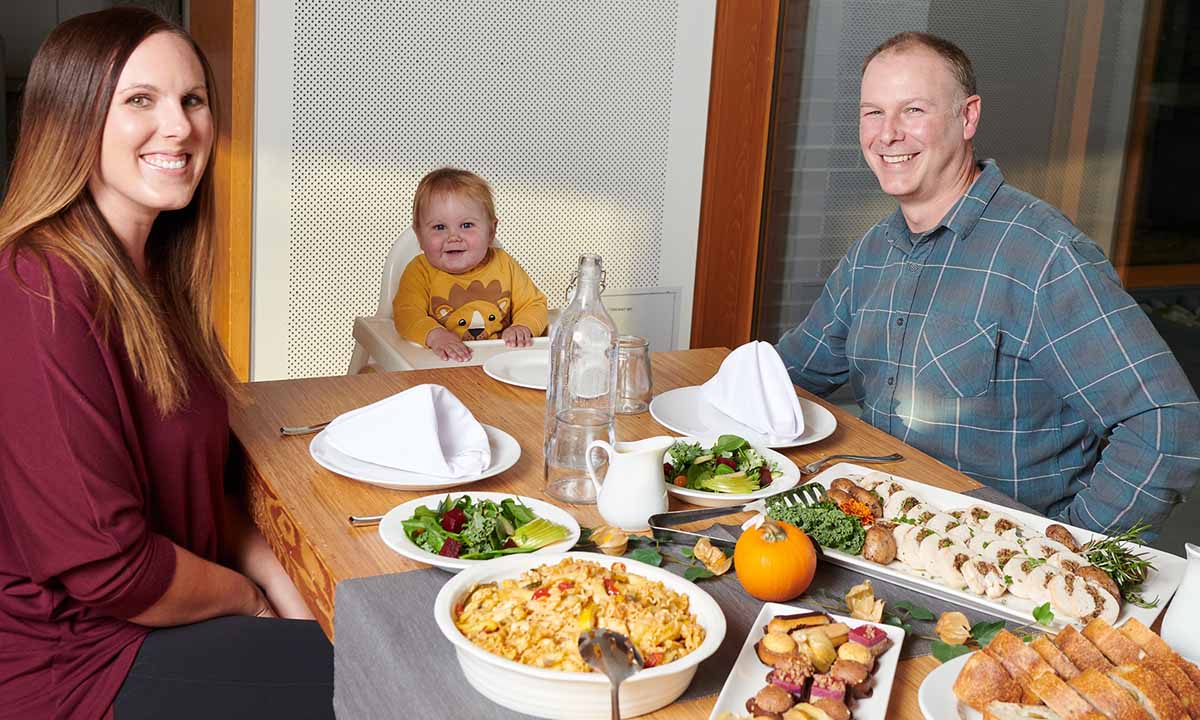 A family enjoy meal together at Ronald McDonald House BC and Yukon